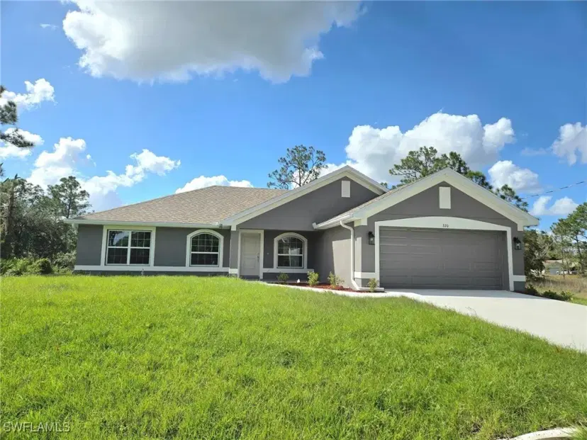 Picture of 320 Malaga Ave S, Lehigh Acres FL 33974