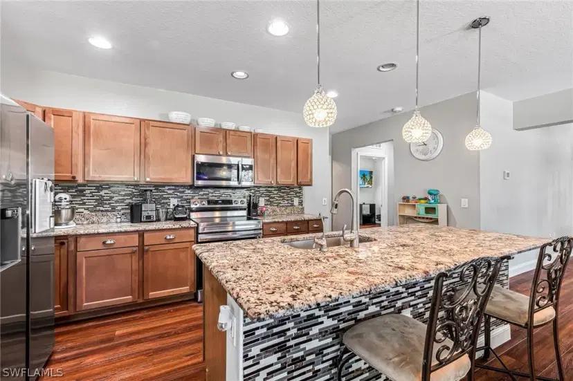 Picture of 114 Paxton St, Lehigh Acres FL 33974