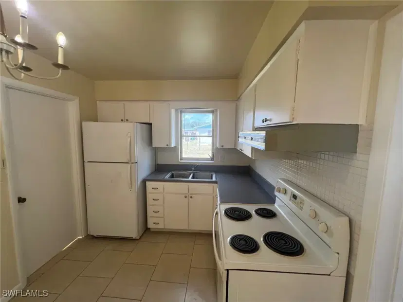 Picture of 317 Morgan Cir N, Lehigh Acres FL 33936