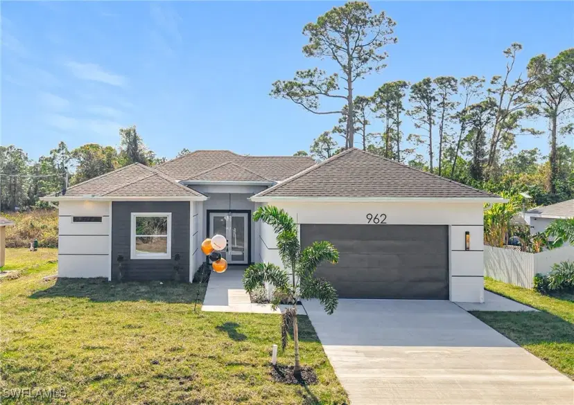 Picture of 962 Iris St E, Lehigh Acres FL 33974