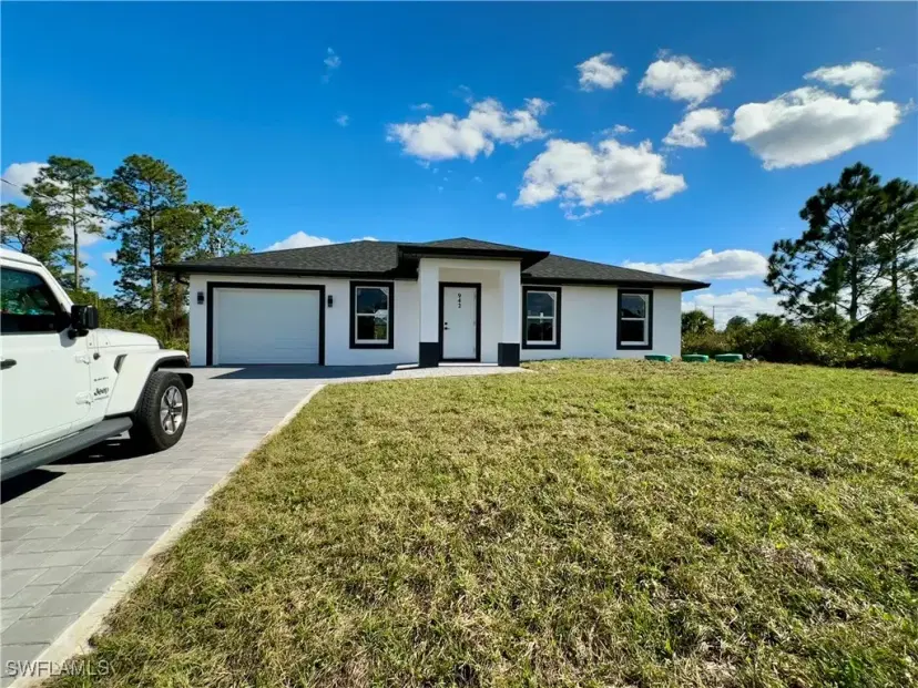 Picture of 942 Gregory St E, Lehigh Acres FL 33974