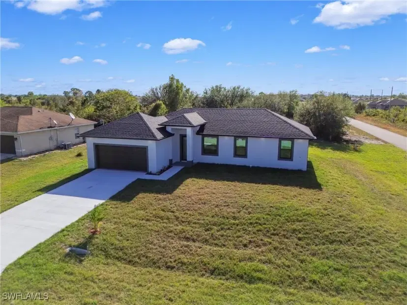 Picture of 210 Paxton St, Lehigh Acres FL 33974