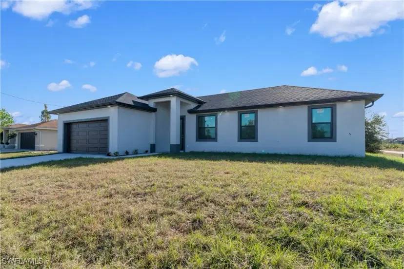 Picture of 210 Paxton St, Lehigh Acres FL 33974