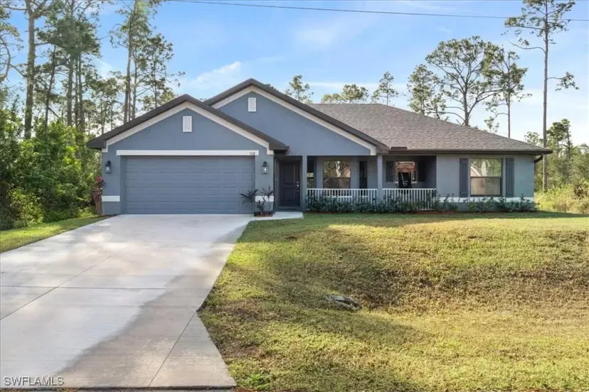 Picture of 908 Macy St E, Lehigh Acres FL 33974