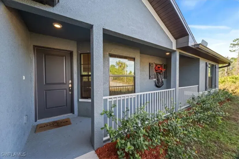 Picture of 908 Macy St E, Lehigh Acres FL 33974