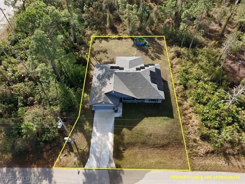 Picture of 908 Macy St E, Lehigh Acres FL 33974