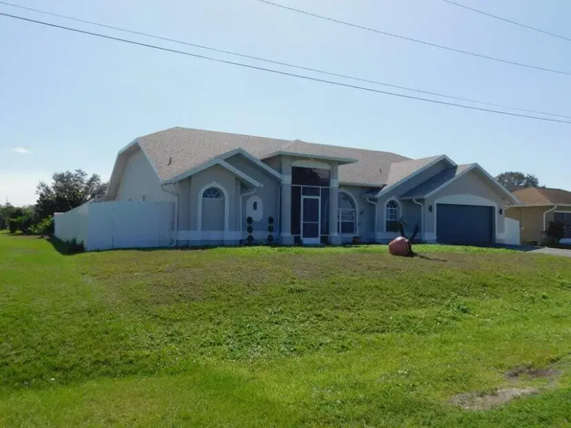 Picture of 680 Manhattan Street E, Lehigh Acres FL 33974