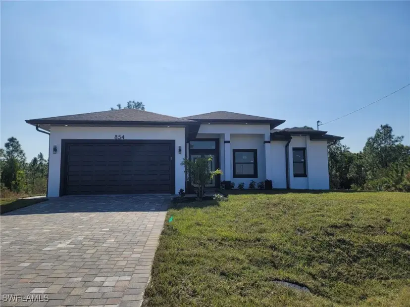 Picture of 854 Palomino St E, Lehigh Acres FL 33974