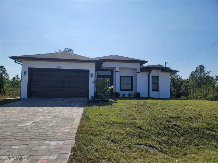 Picture of 854 Palomino St E, Lehigh Acres FL 33974
