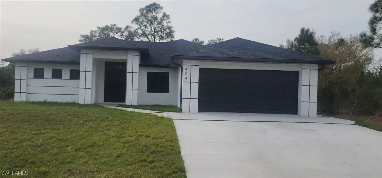 Picture of 404 Lambda Ave S, Lehigh Acres, FL 33974