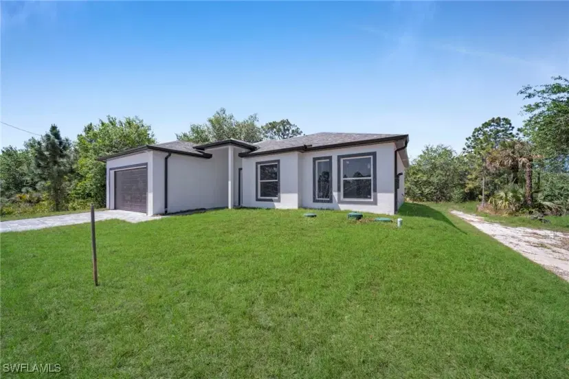 Picture of 406 Columbus Blvd S, Lehigh Acres FL 33974
