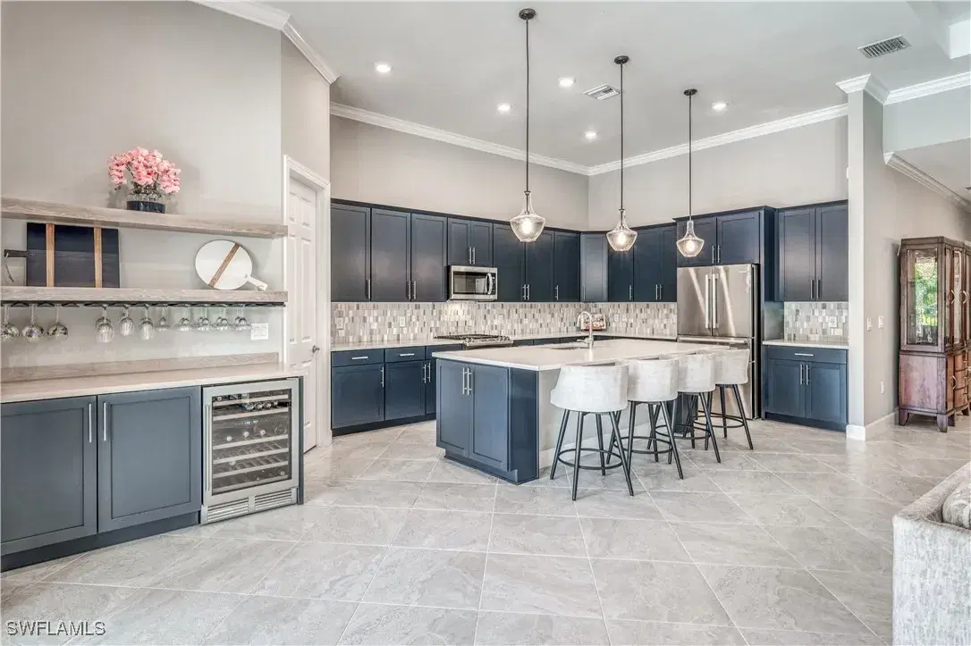 Picture of 9246 Plover Dr, Naples, FL 34120