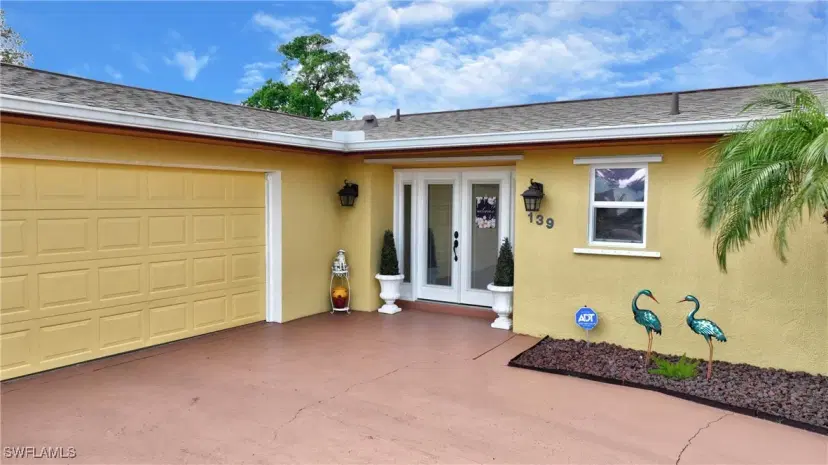 Picture of 139 W Lake Dr, Lehigh Acres FL 33936