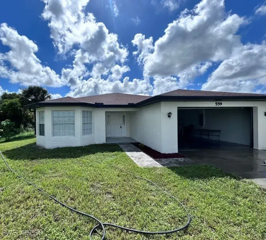 Picture of 559 Bourse Cir, Lehigh Acres, FL 33974