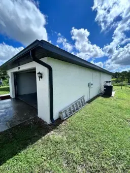 Picture of 559 Bourse Cir, Lehigh Acres, FL 33974