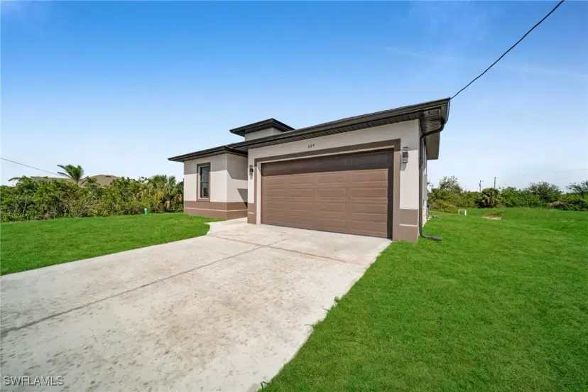 Picture of 409 Grant Blvd, Lehigh Acres FL 33974