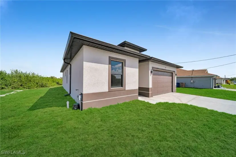 Picture of 409 Grant Blvd, Lehigh Acres FL 33974