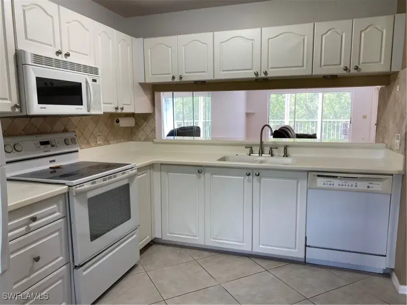 Picture of 3001 Sandpiper Bay Cir B202, Naples FL 34112