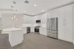Picture of 11408 Quail Village Way C-201, Naples, FL 34119