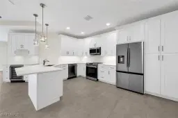 Picture of 11412 Quail Village Way D-201, Naples, FL 34119