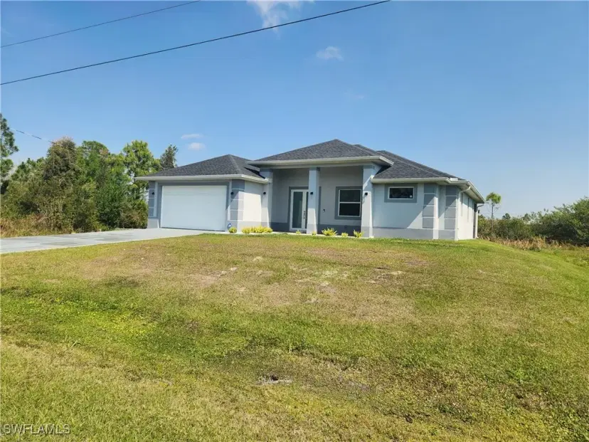 Picture of 406 Muriel St, Lehigh Acres FL 33972