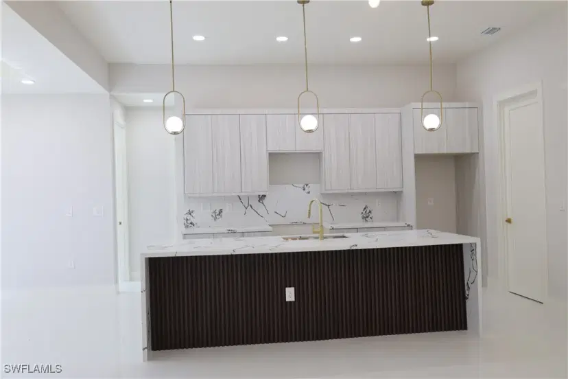Picture of 438 Rathburn St, Lehigh Acres FL 33974