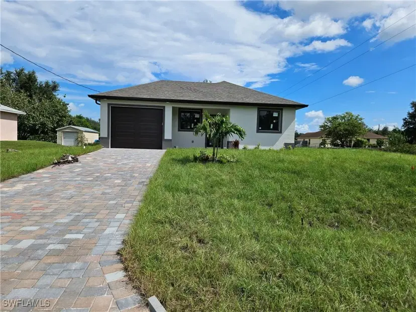Picture of 922 Dobbins St E, Lehigh Acres FL 33974