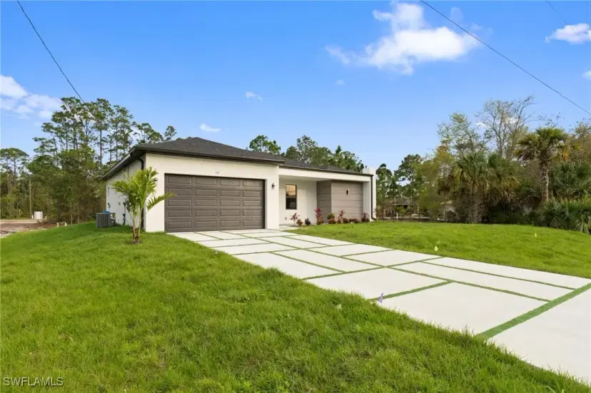 Picture of 567 Flamingo Ave S, Lehigh Acres FL 33974