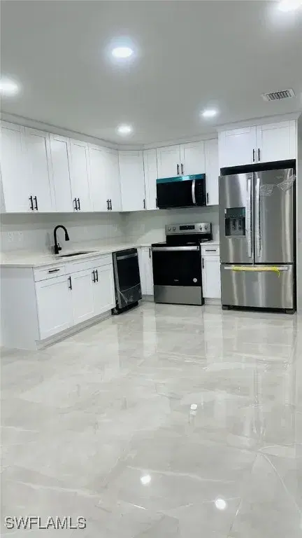 Picture of 840 Clow St E, Lehigh Acres FL 33974