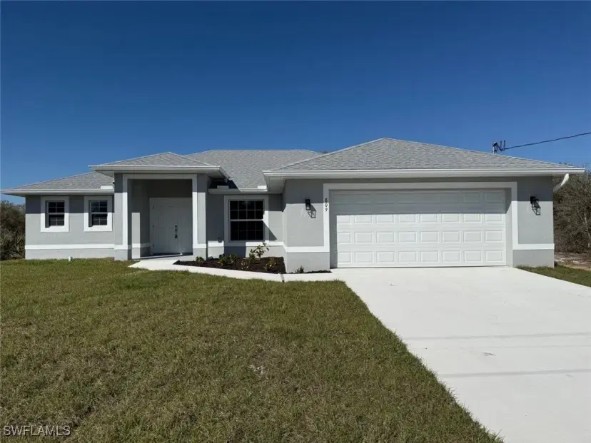 Picture of 809 Poinsettia Ave, Lehigh Acres FL 33972