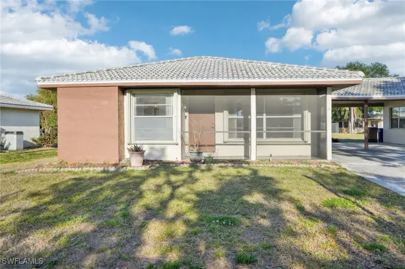 Picture of 4 Parkwood Villas Ct, Lehigh Acres FL 33936