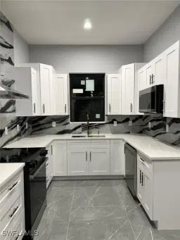 Picture of 1112 Sentinela Blvd E, Lehigh Acres, FL 33974