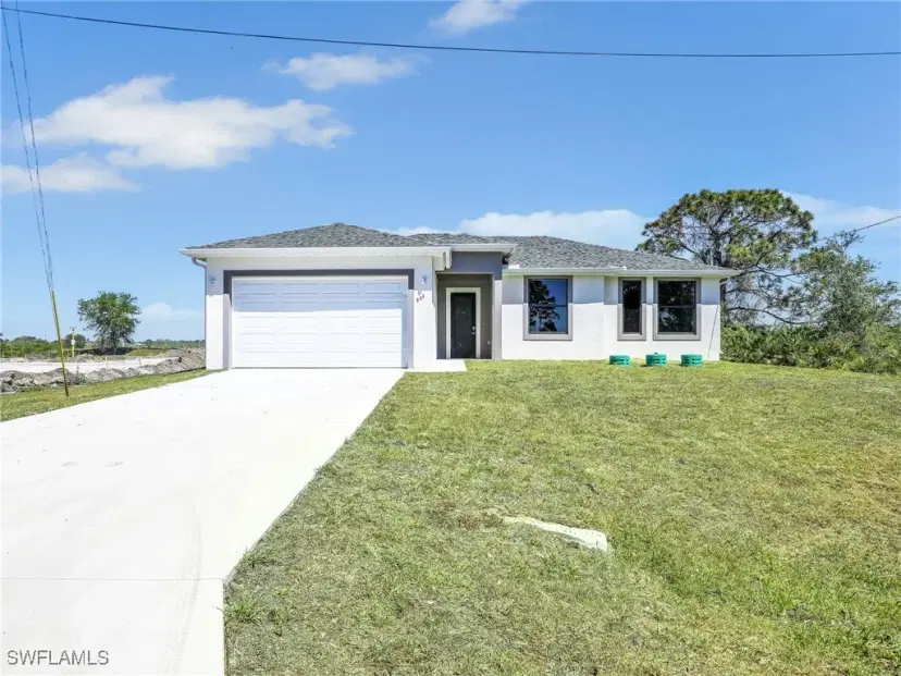 Picture of 633 Cane St E, Lehigh Acres FL 33974
