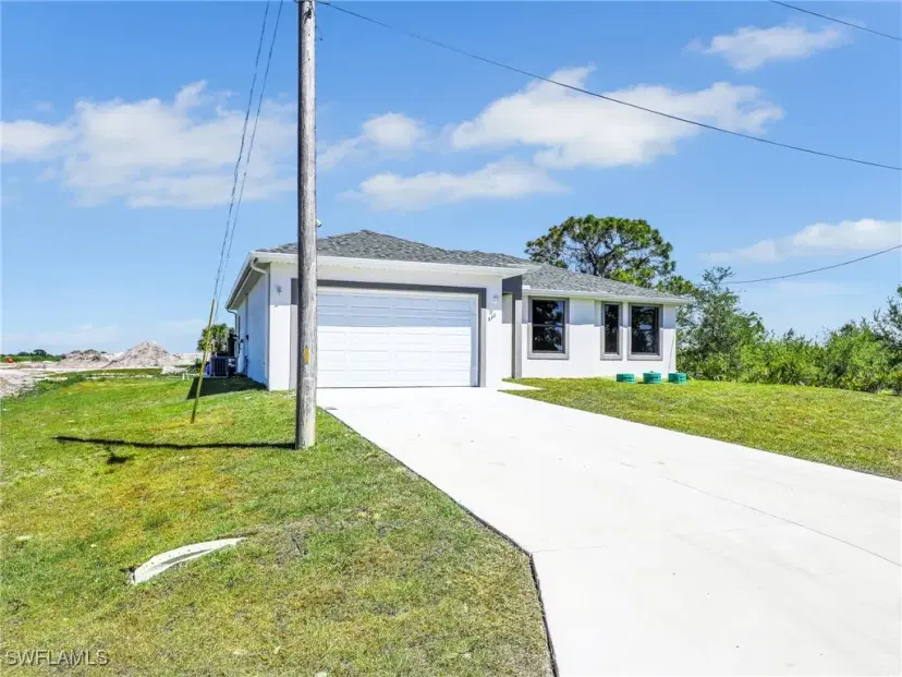 Picture of 633 Cane St E, Lehigh Acres FL 33974