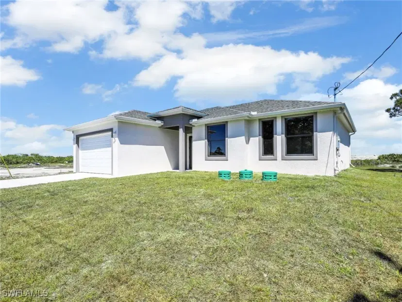 Picture of 633 Cane St E, Lehigh Acres FL 33974