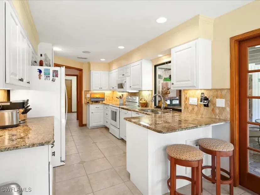 Picture of 5312 Palmetto Woods Dr, Naples FL 34119