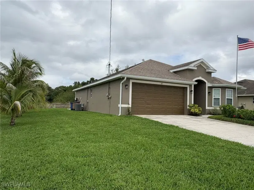 Picture of 815 Theodore Vail St E, Lehigh Acres FL 33974