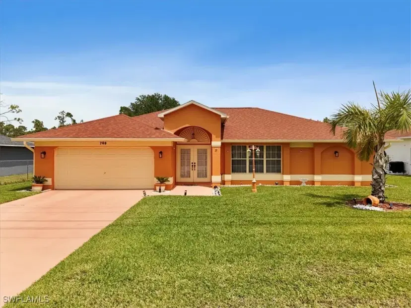 Picture of 709 Milwaukee Blvd, Lehigh Acres FL 33974