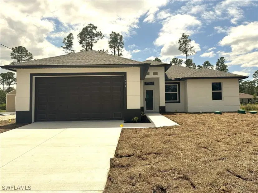 Picture of 718 Foxtail St E, Lehigh Acres FL 33974