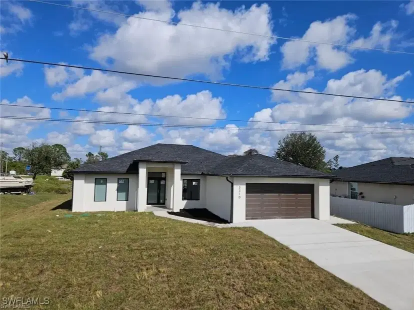 Picture of 154 Patio St, Lehigh Acres FL 33974