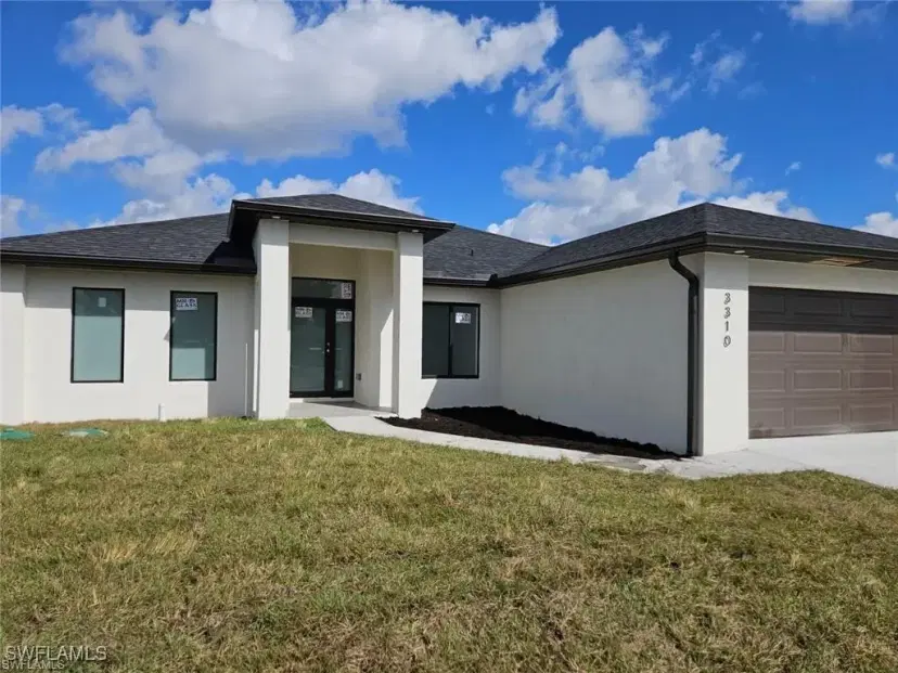 Picture of 154 Patio St, Lehigh Acres FL 33974