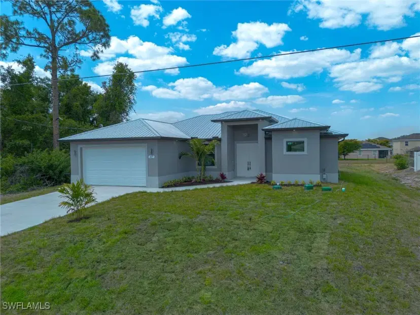 Picture of 417 Paddock St, Lehigh Acres FL 33974