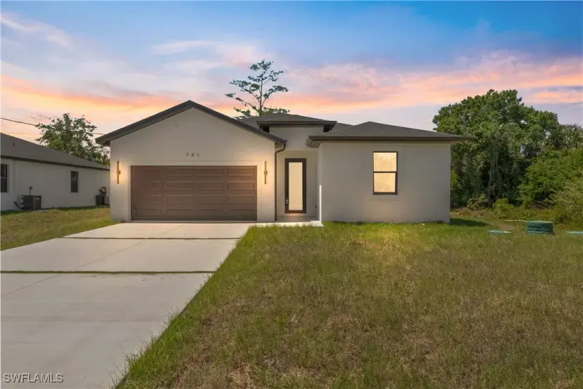 Picture of 741 Woodcrest Dr, Lehigh Acres FL 33972