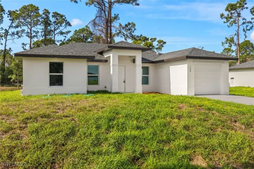 Picture of 708 Lamar St E, Lehigh Acres FL 33974