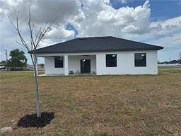 Picture of 707 NE Ne Juanita Pl, Cape Coral, FL 33909