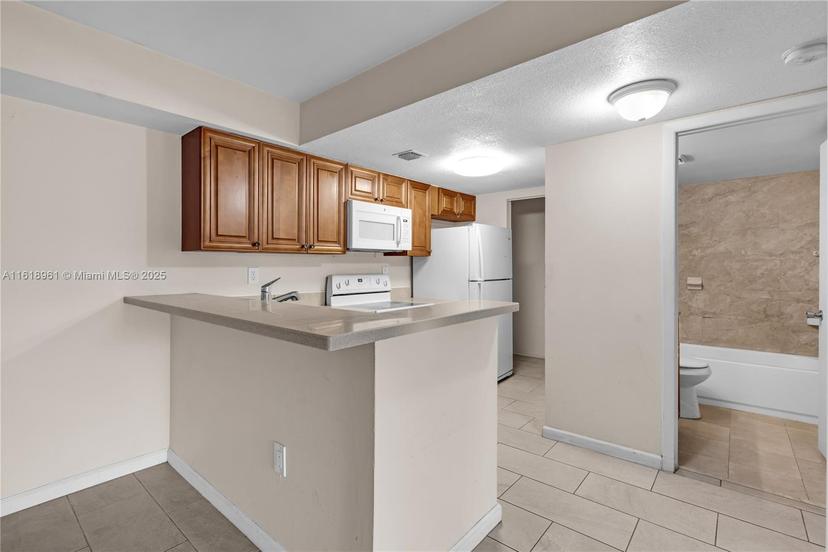 Picture of 7090 NW 179Th St # 104, Hialeah FL 33015