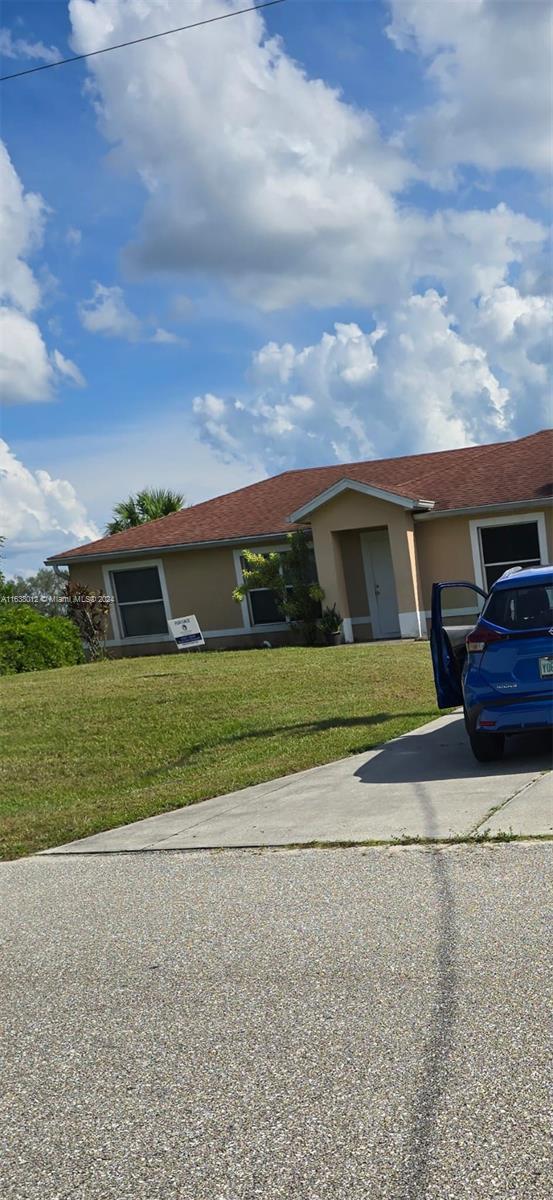 Picture of 466 Rewing St, Lehigh Acres FL 33974