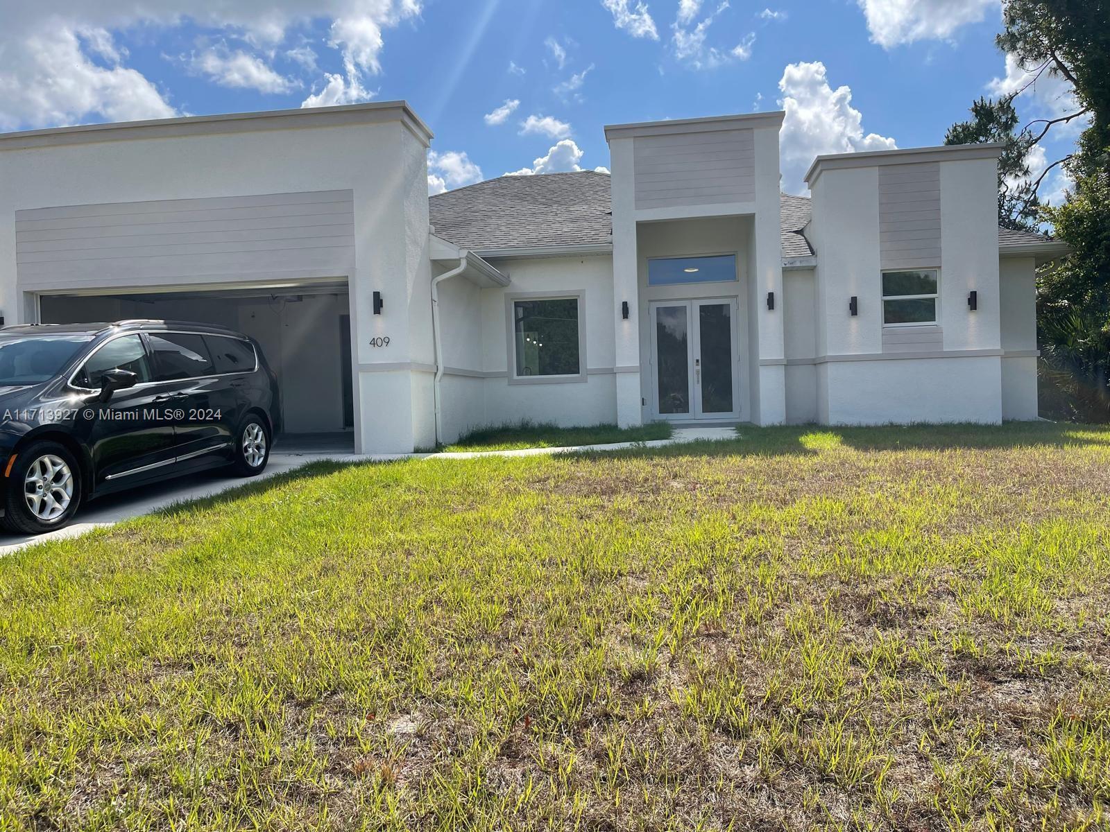 Picture of 409 S Columbus Blvd, Lehigh Acres, FL 33974