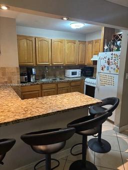 Picture of 6095 W 18Th Ave # 312, Hialeah, FL 33012