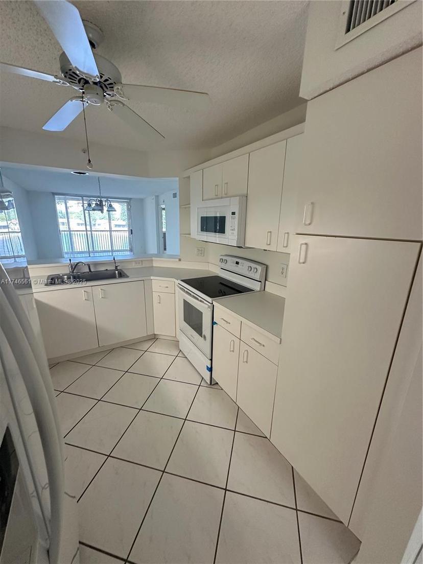 Picture of 9587 Weldon Cir # B203, Tamarac FL 33321